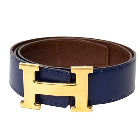 belt with h on it.